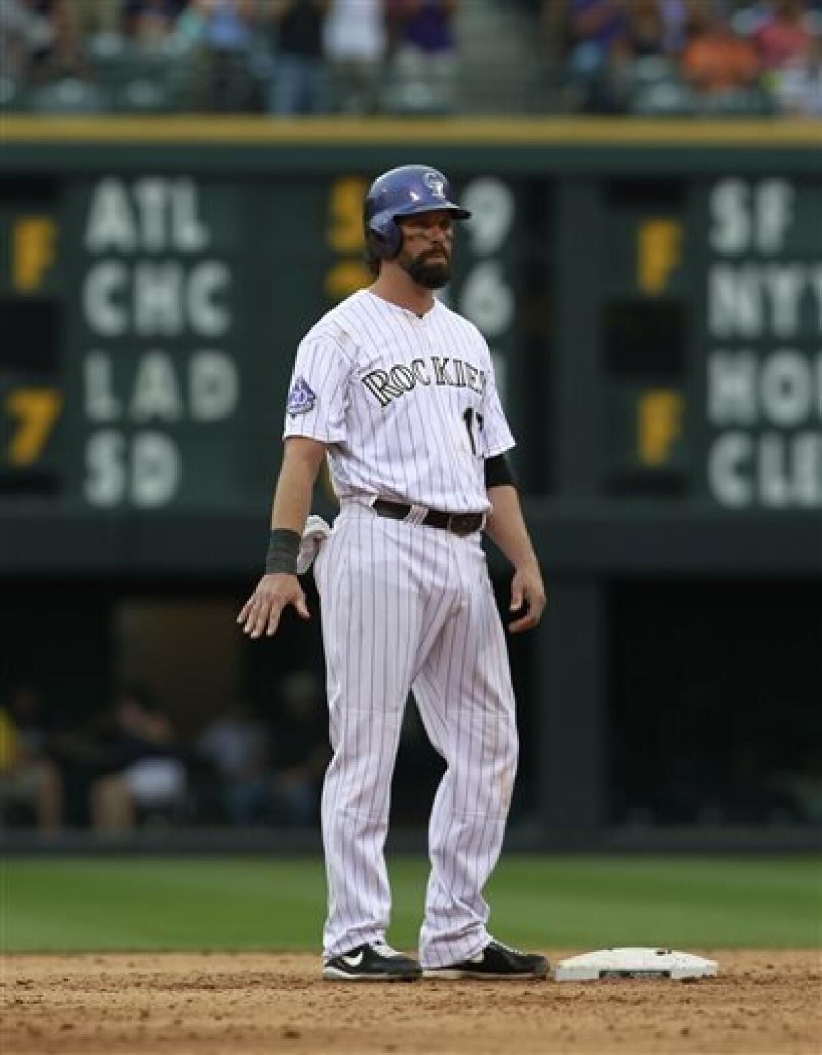 Helton homers in final game in Colorado; Rockies fall to Red Sox