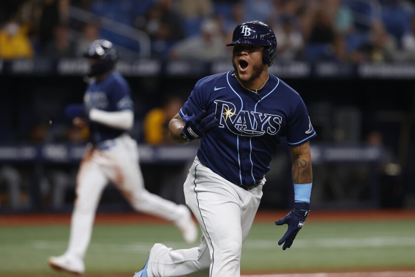 Tampa Bay Rays' Harold Ramirez reacts after driving in the winning run with a single against the Pittsburgh Pirates during the 10th inning of a baseball game Friday, June 24, 2022, in St. Petersburg, Fla. (AP Photo/Scott Audette)