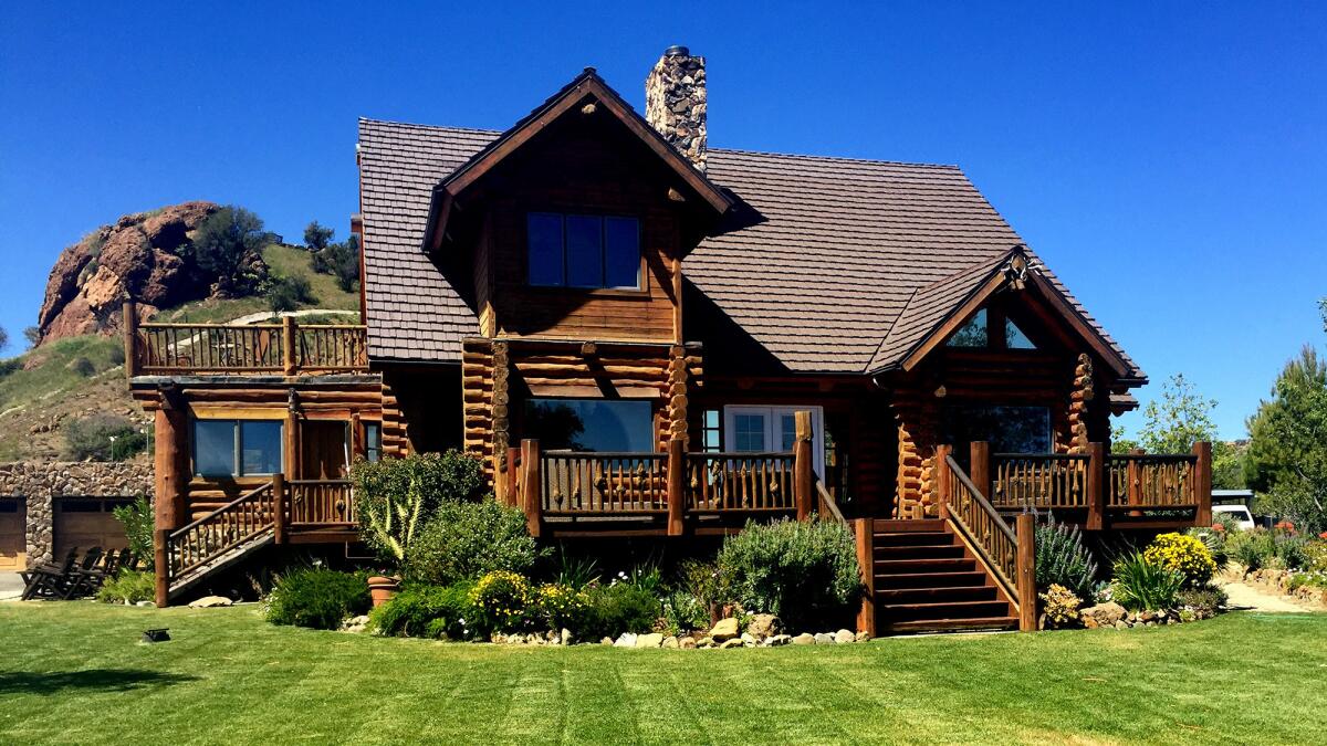 An extensively updated log-cabin home is part of the Saddlerock Ranch operations in Malibu. (Saddlerock Ranch)