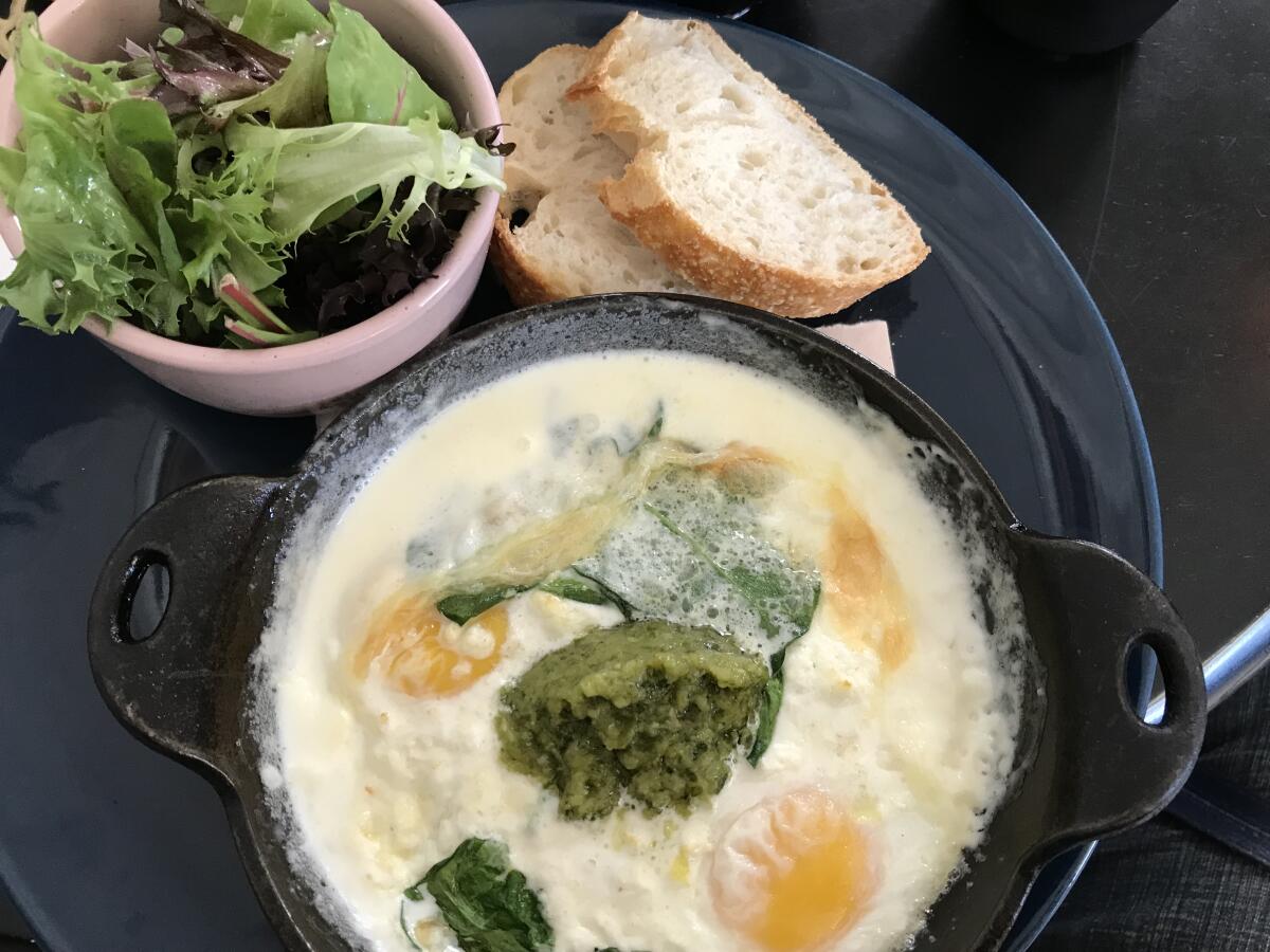The baked green eggs dish at Little Lion cafe in Point Loma.