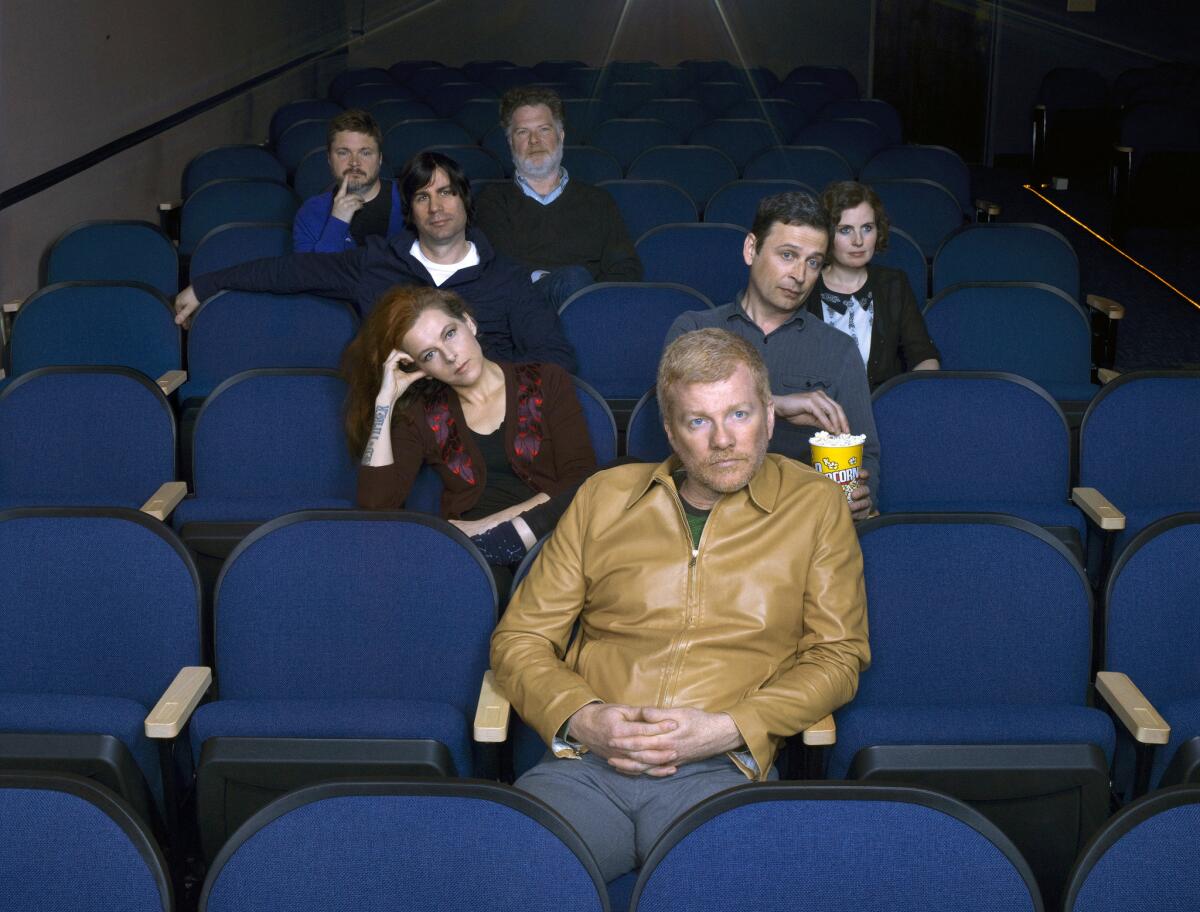 Carl Newman, front; second row, Neko Case, Kurt Dahle; third row, Todd Fancey, Kathryn Calder; back, Blaine Thurier and John Collins make up the band the New Pornographers.