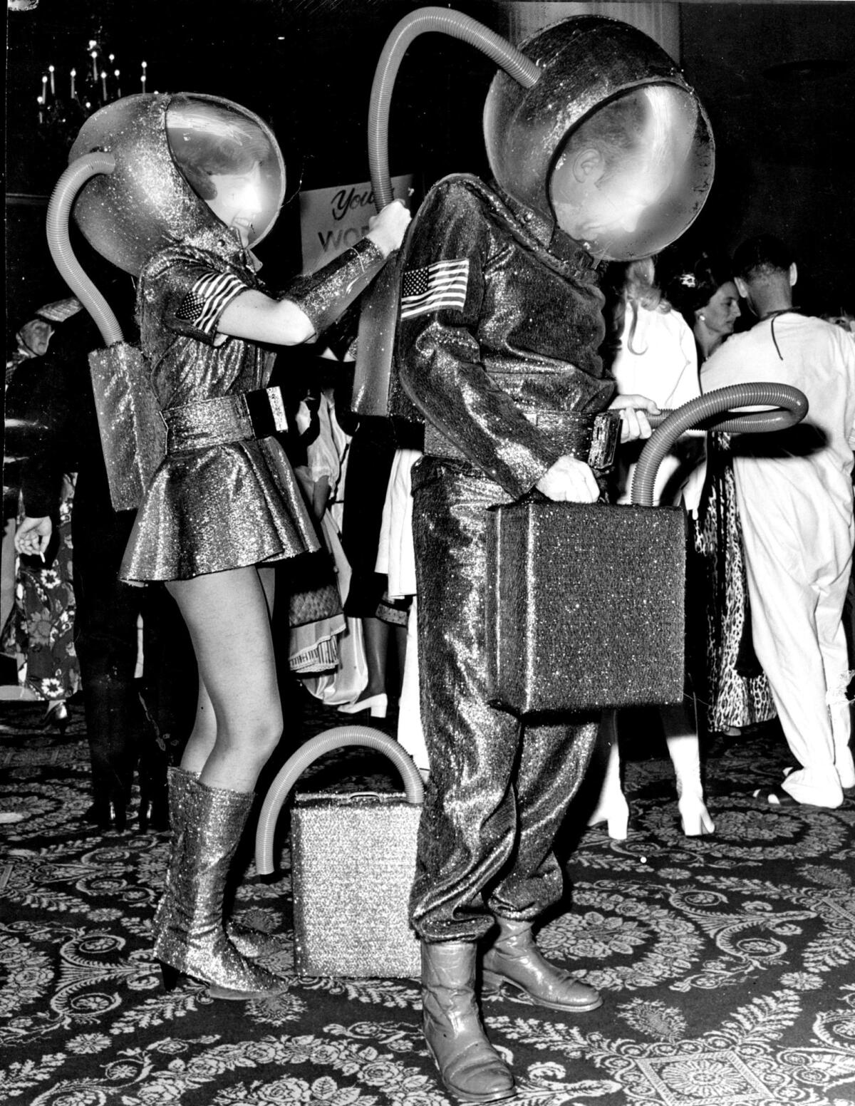 Linda Redeker and George Trammell III are dressed as astronauts at the 1971 Bachelors Ball.