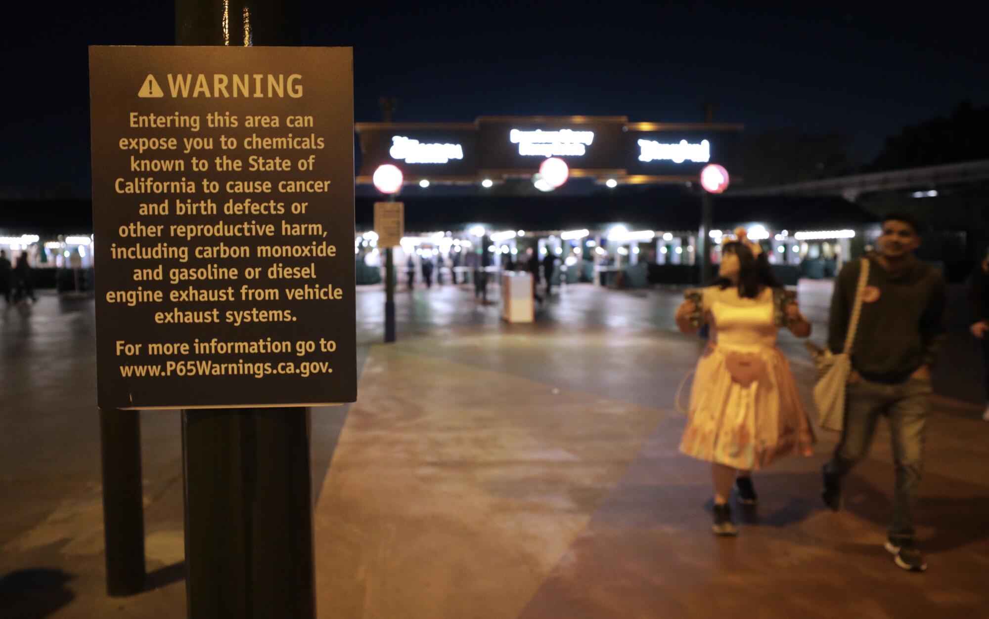 A Proposition 65 sign at Disneyland's entrance warns visitors of the presence of dangerous chemicals.