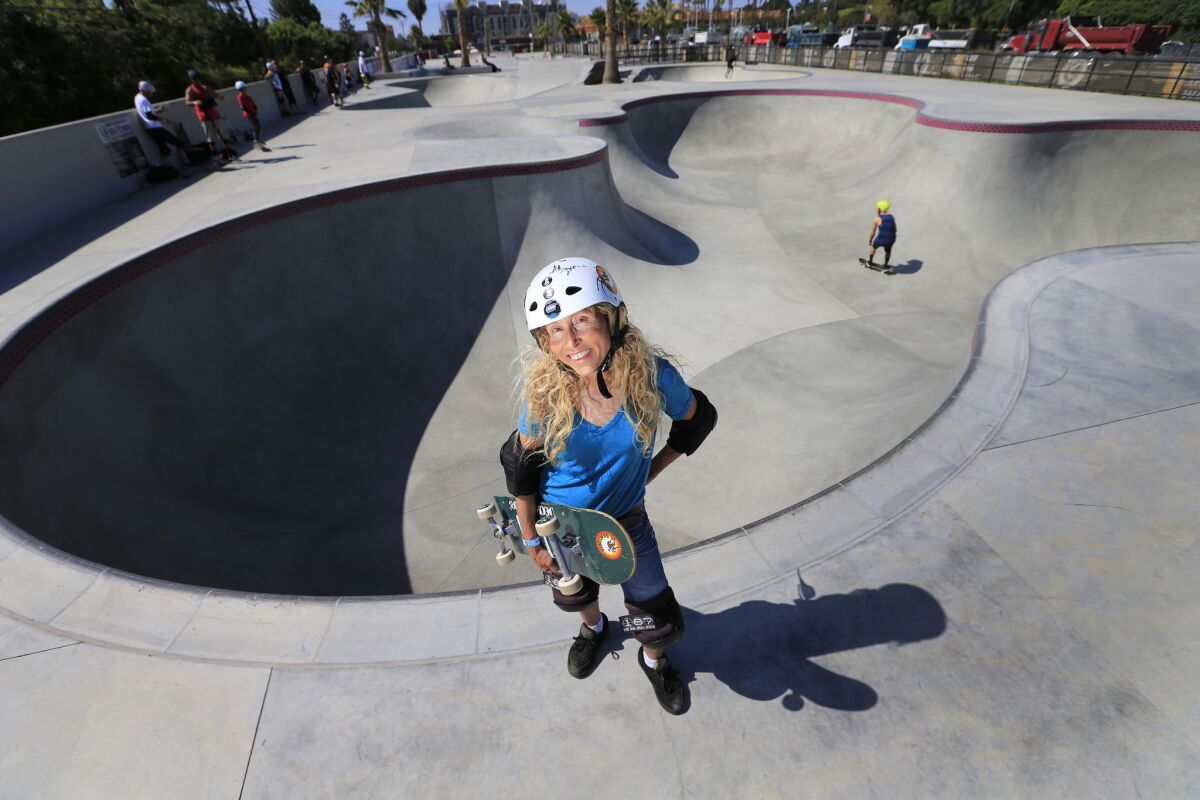 Skateboarder and author Barbara Odanaka takes a break from skateboarding at Vans Off the Wall Skatepark in Huntington Beach.