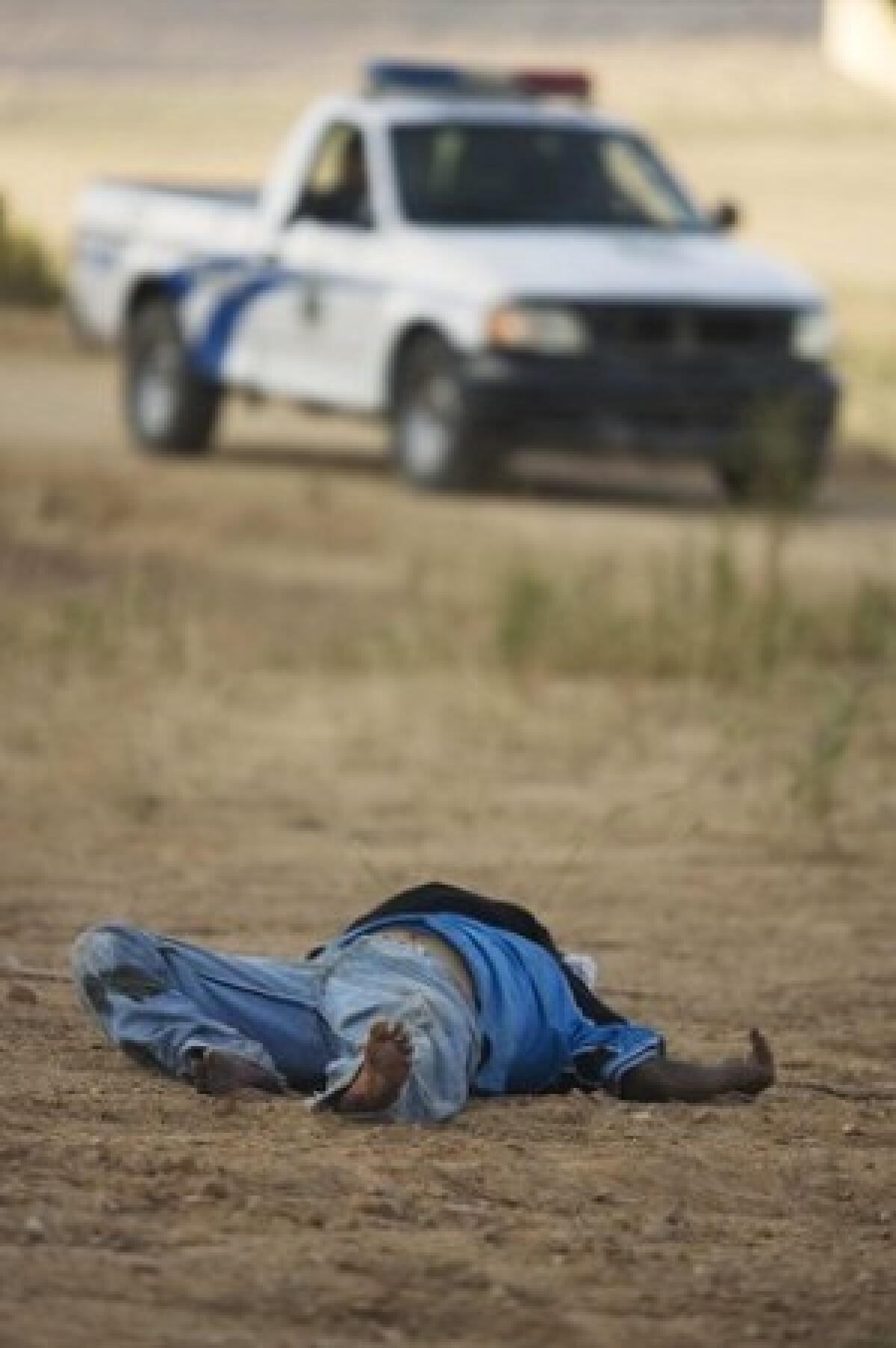 A homicide victim recently on the outskirts of Tijuana, Mexico. Critics dismiss the attorney generals argument as so much spin.