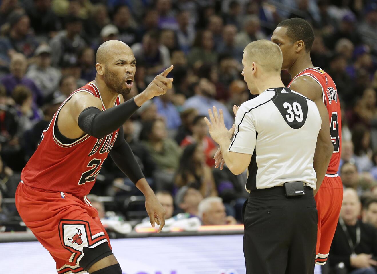 Taj Gibson, left, yells at referee Tyler Ford after he was called for technical foul during the second half against the Sacramento Kings on Monday, Feb. 6, 2017, in Sacramento, Calif.