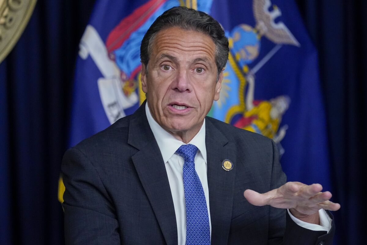 New York Gov. Andrew Cuomo gestures at a news conference in New York.