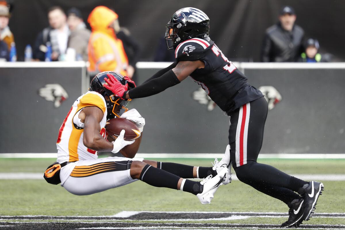 Wildcats wide receiver Saeed Blacknall beats Guardians defensive back Andrew Soroh for a 42-yard touchdown catch in the third quarter Saturday in East Rutherford, N.J.