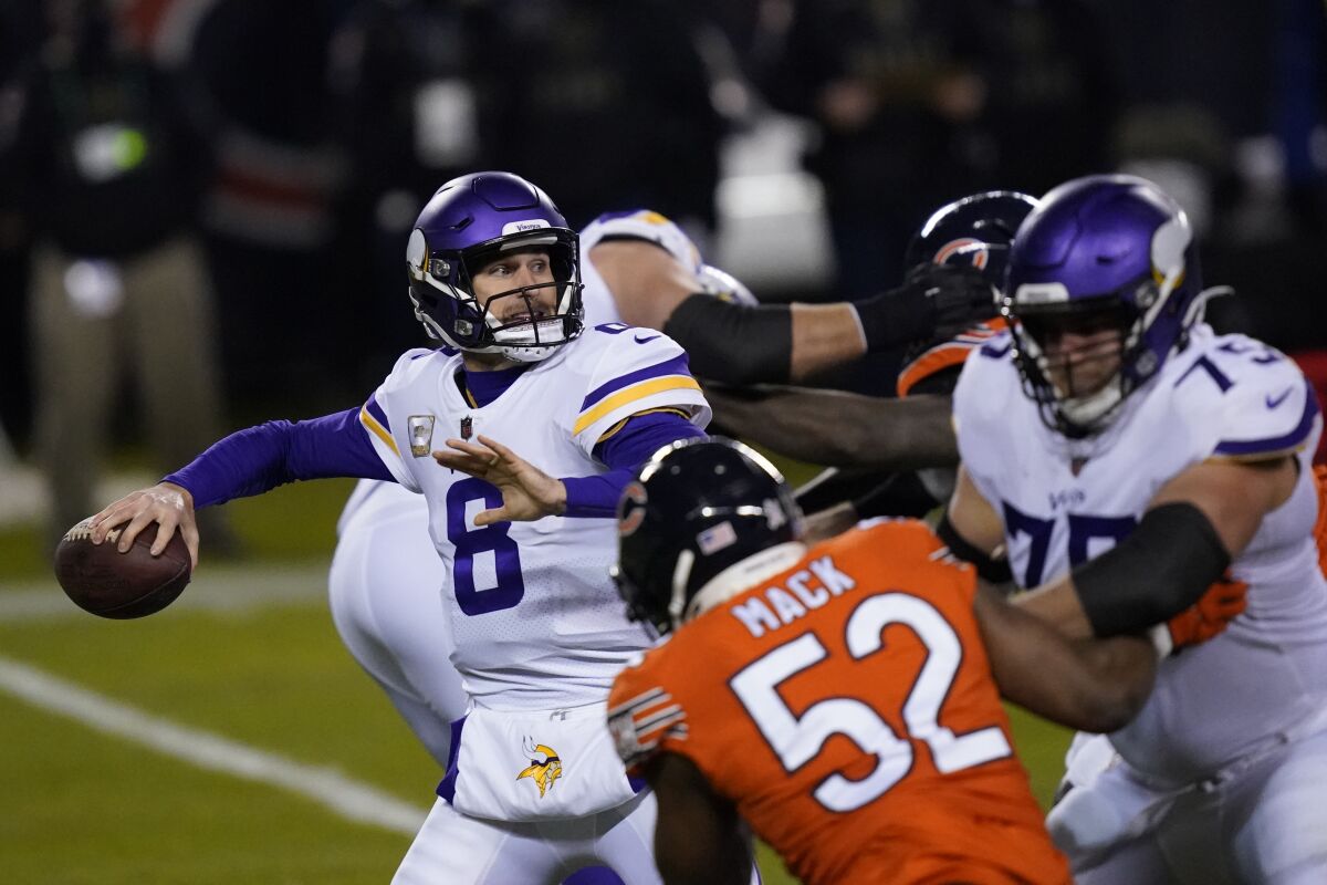 Minnesota Vikings quarterback Kirk Cousins throws during the first half of an NFL football game against the Chicago Bears Monday, Nov. 16, 2020, in Chicago. (AP Photo/Charles Rex Arbogast)