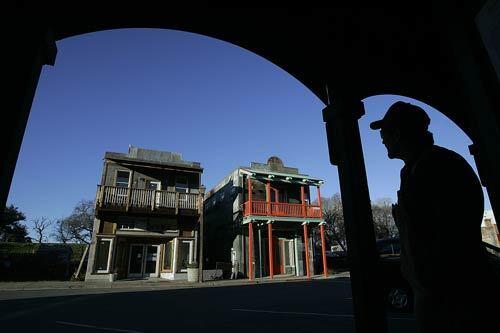 Mark Harris looks out on a desolate street in Isleton. Its hard to find a California city in as much trouble as the Sacramento-San Joaquin River Delta town  817 residents, $950,000 in the hole and trying like crazy to stave off bankruptcy.