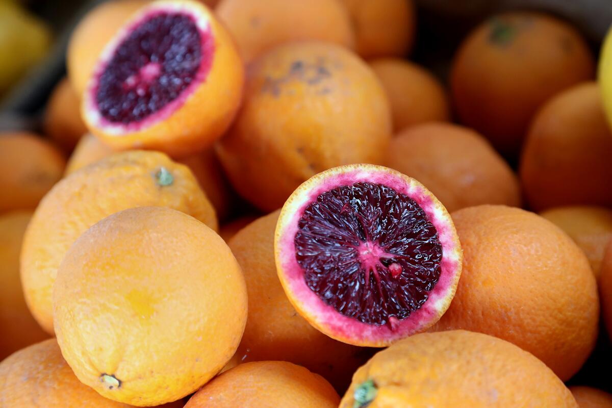 Blood oranges by Sunny Cal farms for sale at the Irvine Regional Park Farmers Market in Orange.