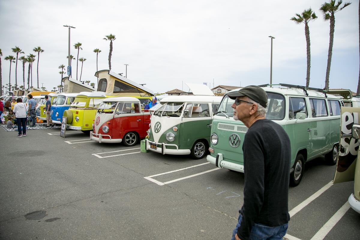 Hundreds of Volkswagen Buses attend an event at Huntington City Beach for the unveiling for the new ID.Buzz, on Friday.