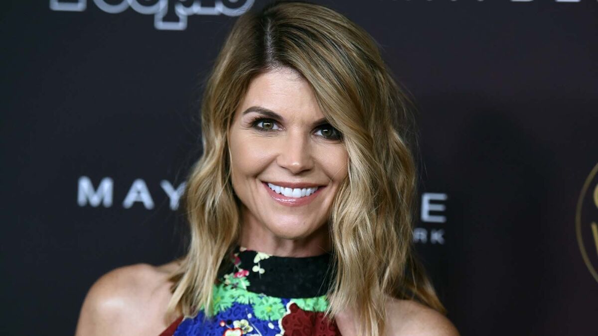 Lori Loughlin and her husband, Mossimo Giannulli, were newly charged in an indictment returned by a grand jury in Boston.
