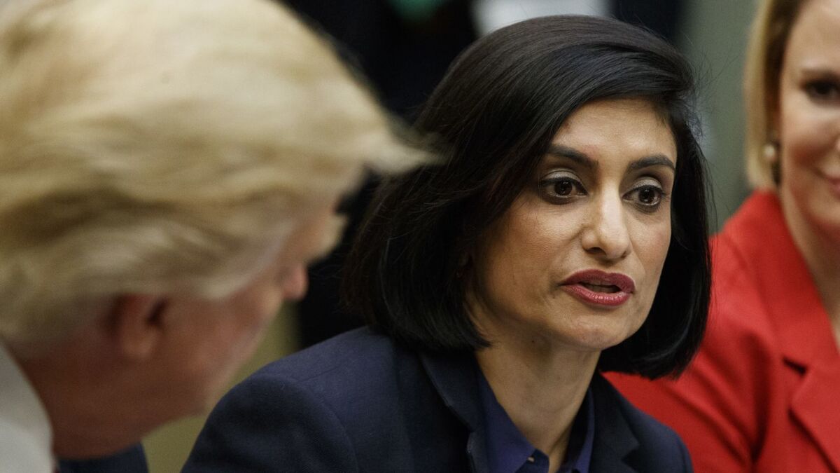 Seema Verma, administrator of the Centers for Medicare and Medicaid Services, speaks during a White House meeting with President Trump in 2017. She hailed a new Medicaid block grant plan Jan. 30 as "groundbreaking."