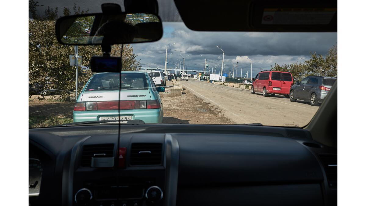 Crossing the border from Ukraine to the Crimean peninsula used to be a simple process, but it's now a complex ordeal.