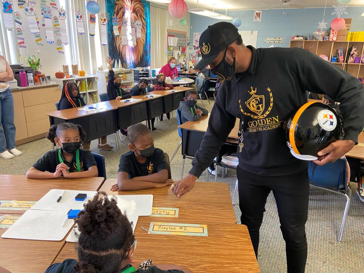 Former Steelers safety Robert Golden works with students at Golden Charter Academy in Fresno.