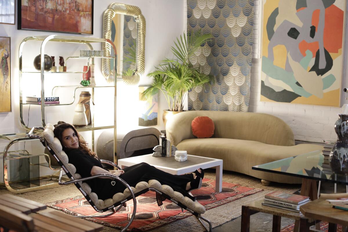 Tricia Beanum reclines on a vintage Ludwig Mies van der Rohe chaise.