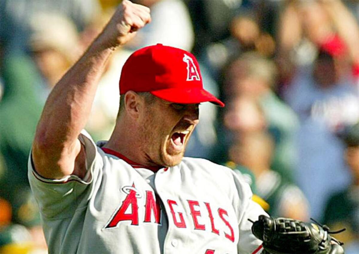 Former Angels pitcher Troy Percival celebrates after defeating the Oakland Athletics back in 2004.