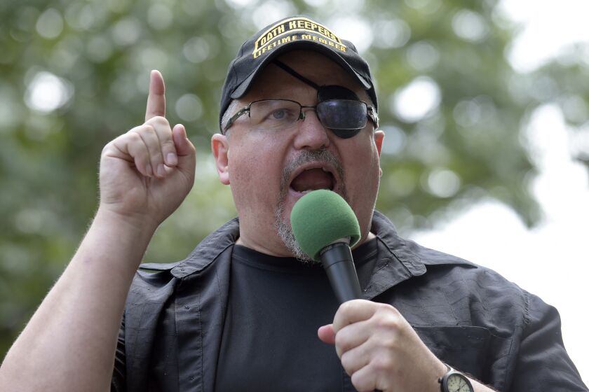 Oath Keepers founder Stewart Rhodes speaks at a rally outside the White House in 2017.