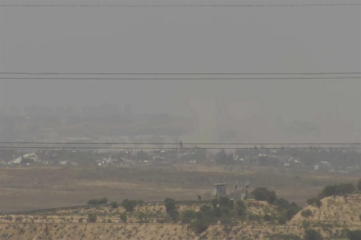 A screenshot taken from AP video showing a general view of northern Gaza as seen from Southern Israel.