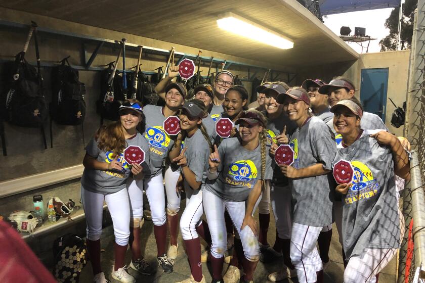 Esperanza High players pose for a photo after winning the Southern Section Division 1 softball title on June 18, 2021, in Irvine.