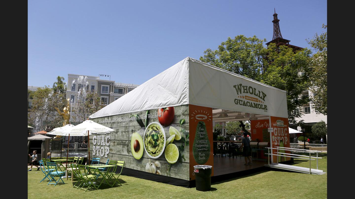 Photo Gallery: Wholly Guacamole's Guac Stop pop up restaurant gives out free samples of guacamole at Americana at Brand