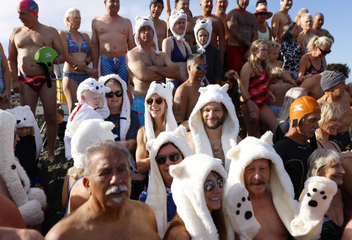 Annual polar bear plunge at La Jolla Shores serves as hangover cure,  head-clearing for the new year - The San Diego Union-Tribune