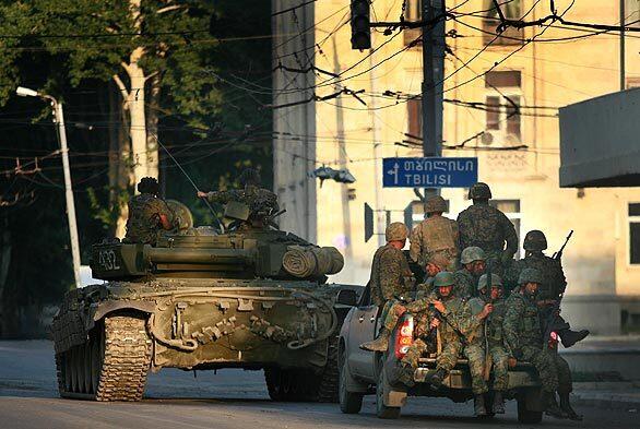 Georgian troops leave Gori and head towards Tbilisi.