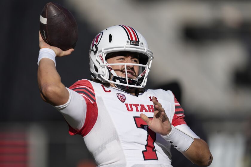 Utah quarterback Cameron Rising warms up before an NCAA college football game.