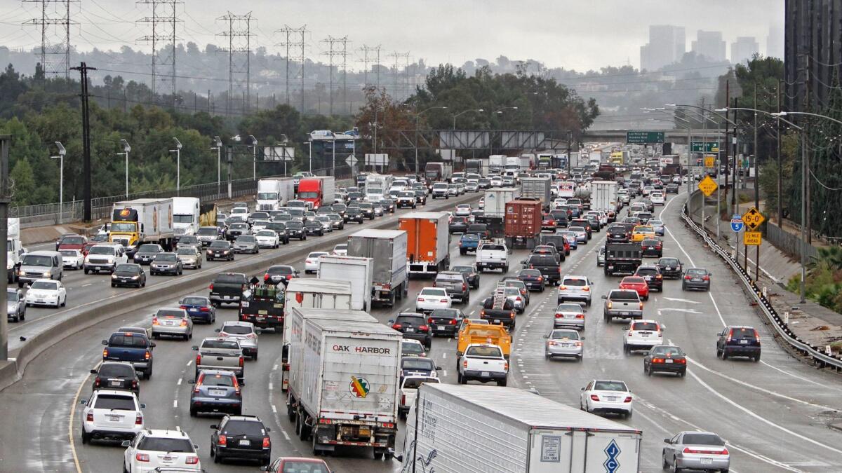 Traffic moves slowly on a rainy morning on the Interstate (5) Freeway, near the Glendale/Los Angeles border.