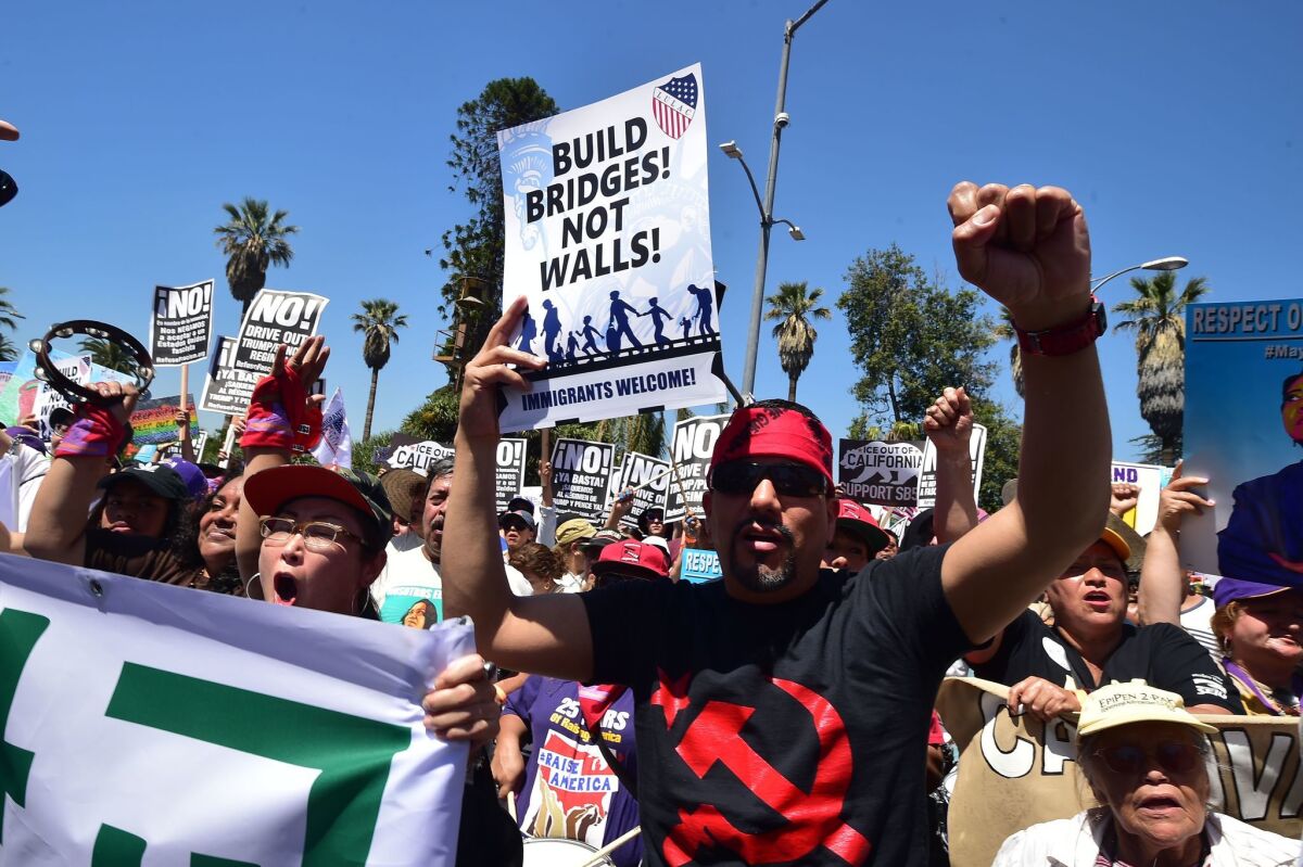 May Day protesters march against President Trump's immigration policy in Los Angeles