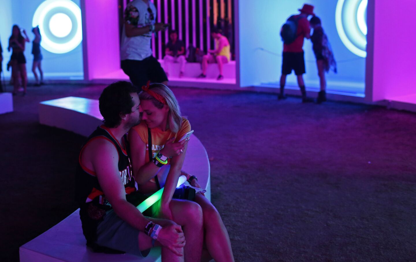 A couple shares a moment inside the Portals art installation at the Coachella Valley Music and Arts Festival.