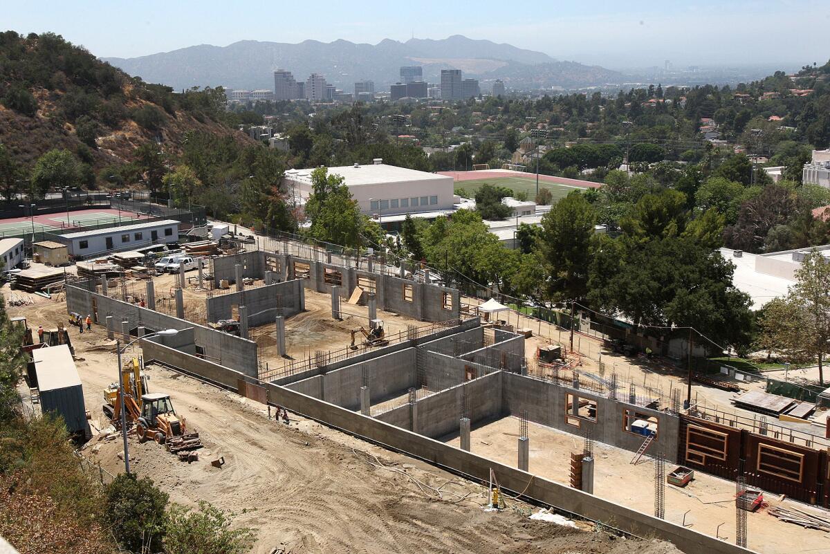 The construction site, with Glendale in the horizon, at Glendale Community College for the lab/college services building pictured on Friday, July 25, 2014.