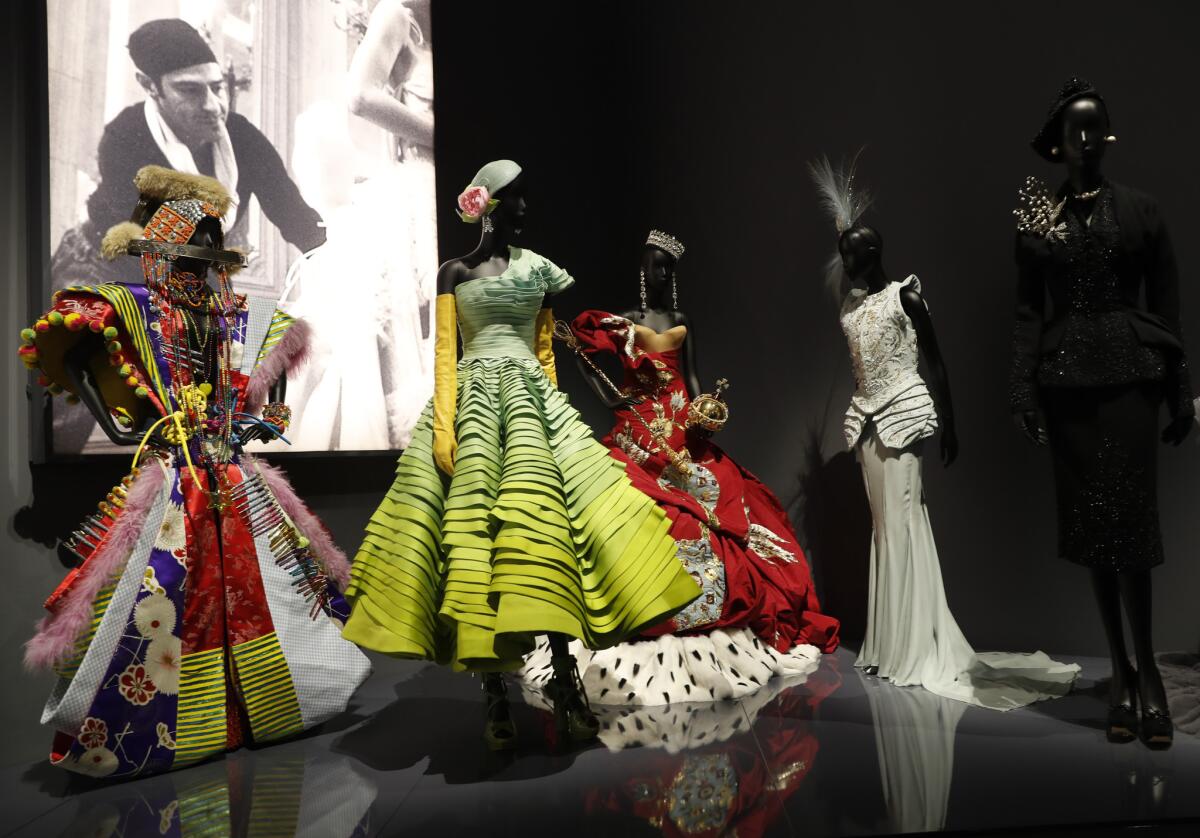 A selection of Christian Dior dresses designed by John Galliano, displayed at the V&A Museum.