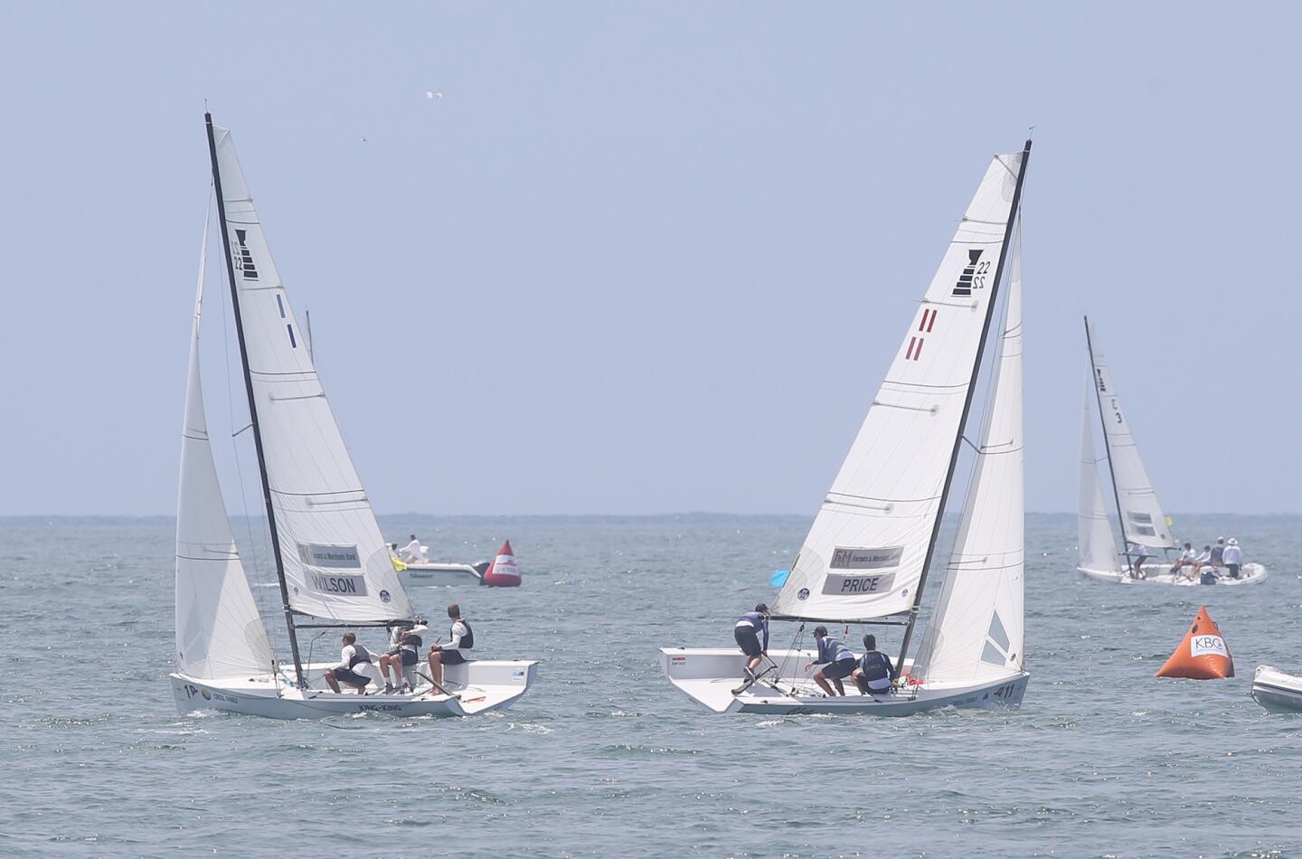 Crews from Australia and New Zealand, from left, race in the Balboa Yacht Club's GovernorÕs Cup south of the Newport Pier on Thursday.
