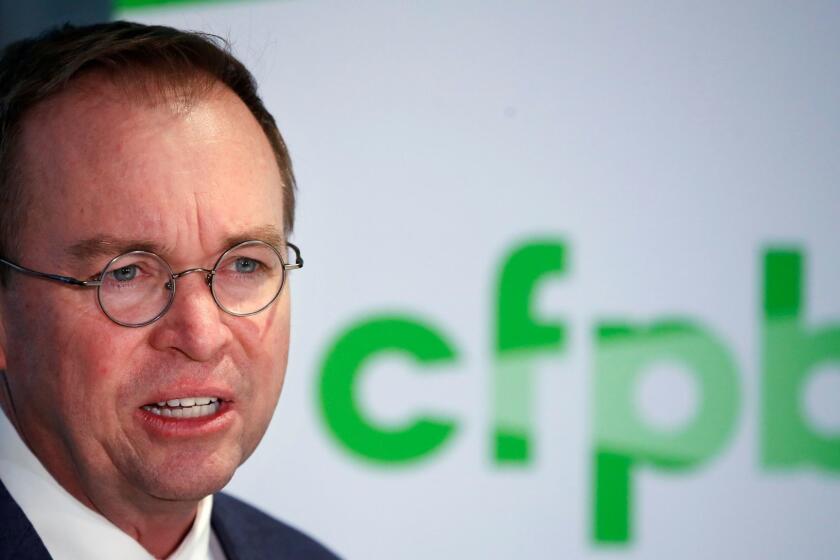 Mick Mulvaney speaks during a news conference after his first day as acting director of the Consumer Financial Protection Bureau in Washington, Monday, Nov. 27, 2017. (AP Photo/Jacquelyn Martin)