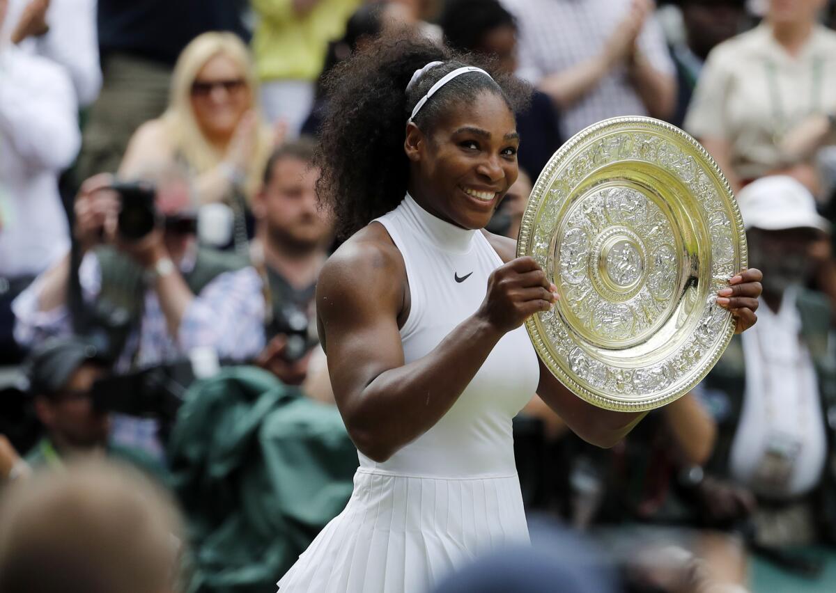 Serena Williams, smiling broadly after winning the women's singles title at Wimbledon in 2016