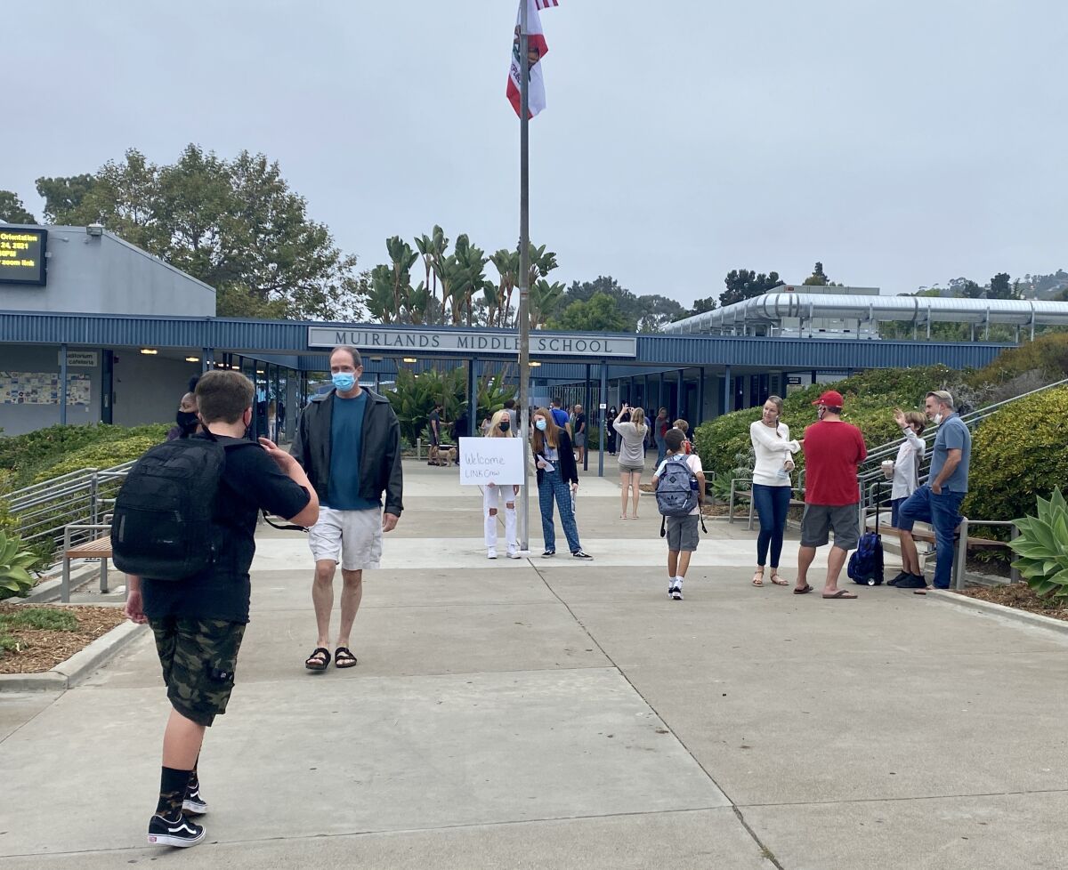 Students make their way to Muirlands Middle School on Aug. 30 for the first day of classes in the new school year.
