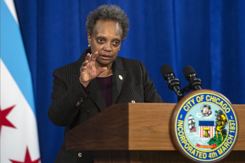 FILE - In this Dec. 17, 2020, file photo, Chicago Mayor Lori Lightfoot speaks during a news conference at City Hall in Chicago. Lightfoot on Wednesday, March, 3, 2021, proposed changes in the way police serve search warrants, the latest move to regain public trust in her as well as the police force that was damaged when officers stormed into the wrong home and forced the woman living there to stand naked in handcuffs for several minutes. (Anthony Vazquez/Chicago Sun-Times via AP, File)