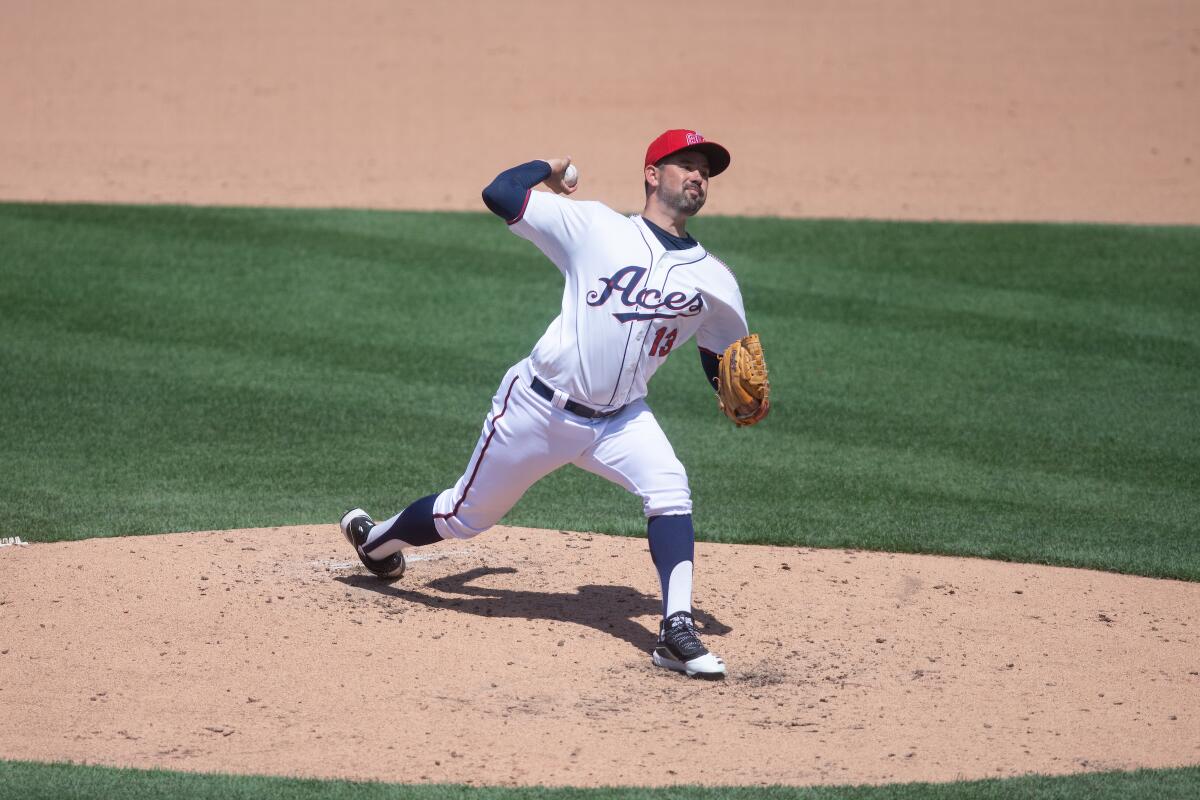 Reno Aces pitcher Zach Lee winds up for a pitch.