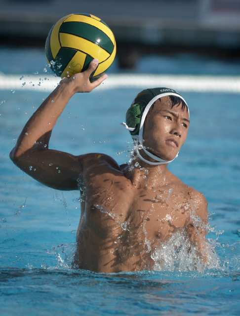 Quan Nguyen (4) of Costa Mesa shoots to score his team's eighth point against Estancia during the Battle for the Bell.