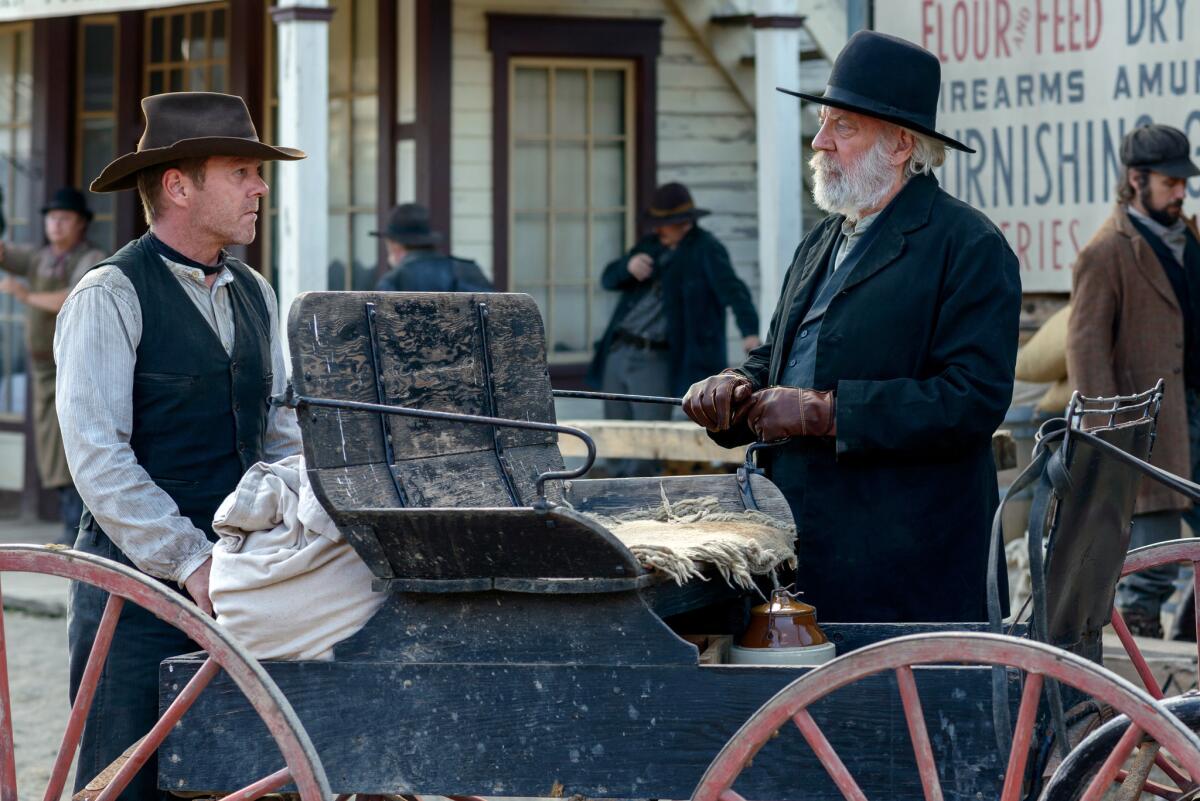 Kiefer Sutherland, left, and Donald Sutherland in the western "Forsaken."