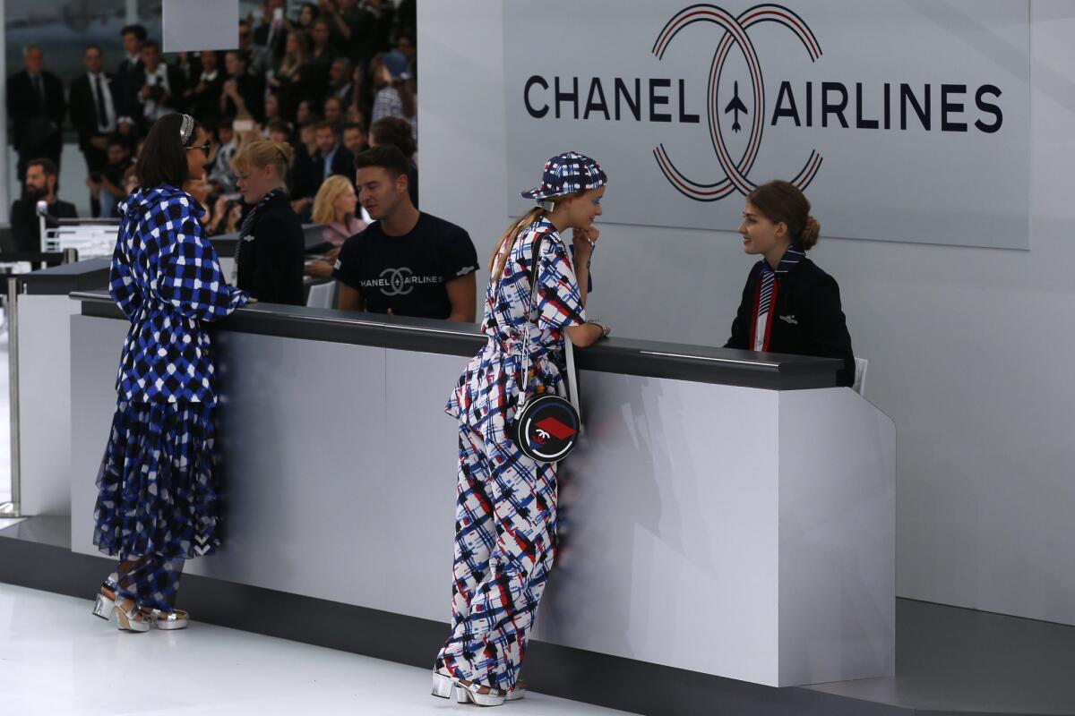 A model wears a creation for Chanel's Spring-Summer 2016 ready-to-wear fashion collection presented during the Paris Fashion Week, Tuesday, Oct. 6, 2015 in Paris, France. (AP Photo/Francois Mori)