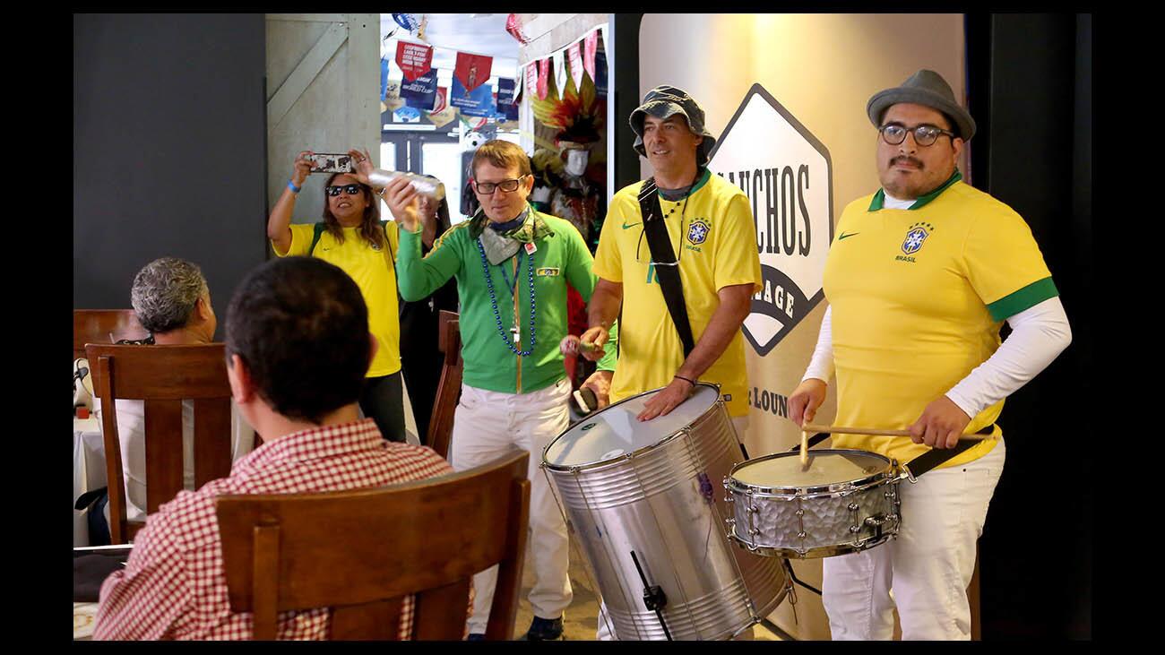 Photo Gallery: Local crowd cheers Brazil to advance in World Cup play