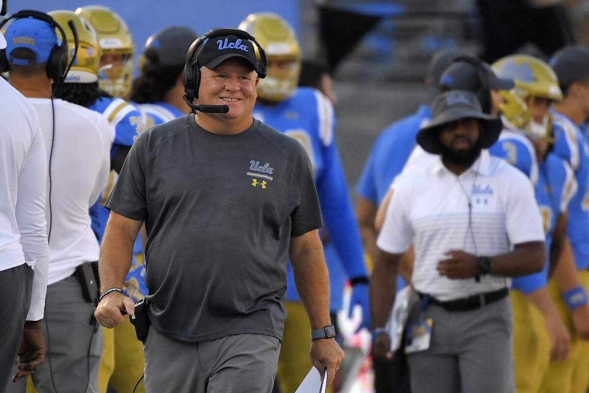 UCLA coach Chip Kelly walks the sideline during a game against Oklahoma in September 2019.