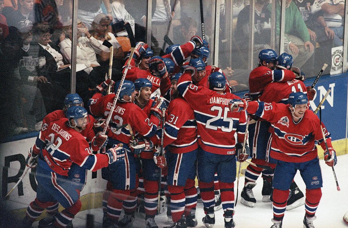 The Montreal Canadiens celebrate their overtime victory over the Kings in Game 4 of the 1993 Stanley Cup Final.