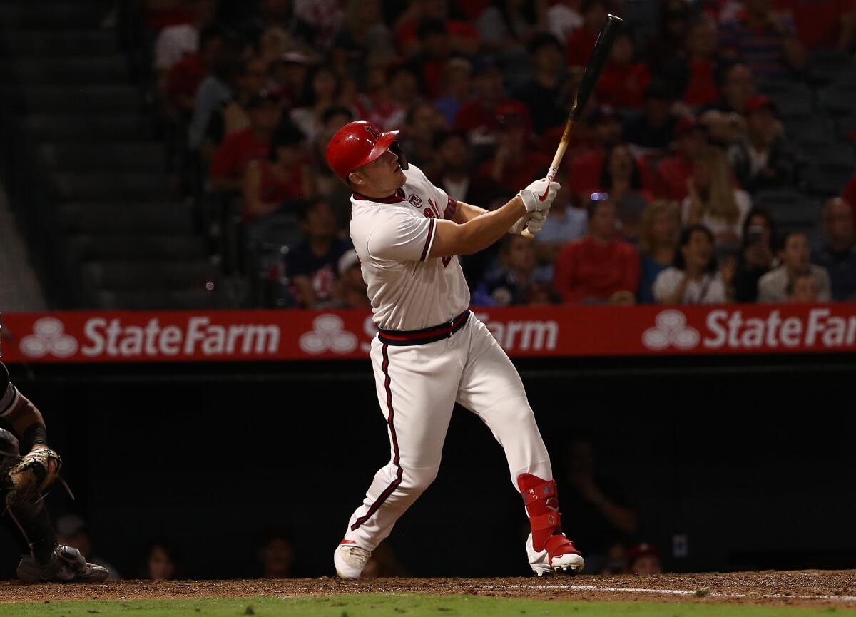 The Angels' Mike Trout watches his solo home run in the fifth inning Aug. 16, 2019.