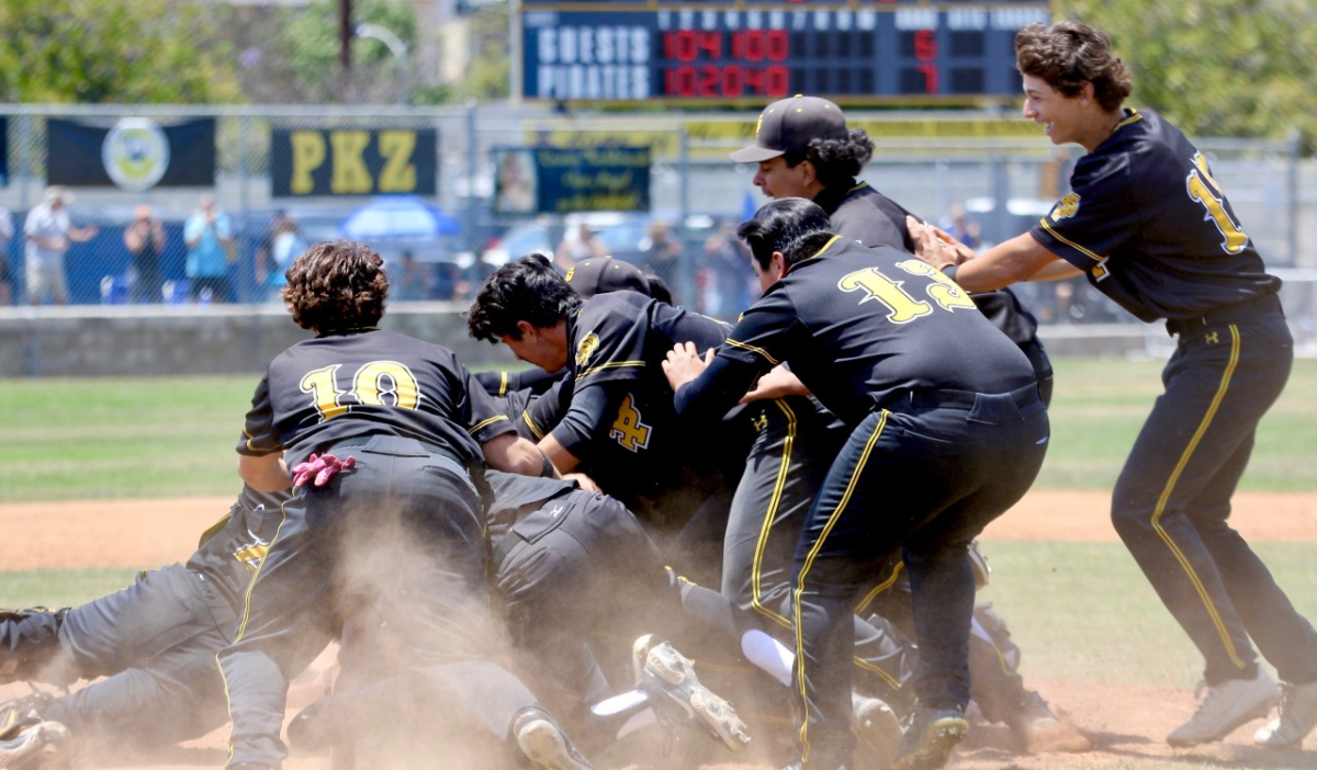 San Pedro baseball players celebrate moments after beating El Camino Real.