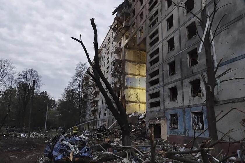 A building damaged by shelling in Zaporizhzhia, Ukraine, on Sunday.