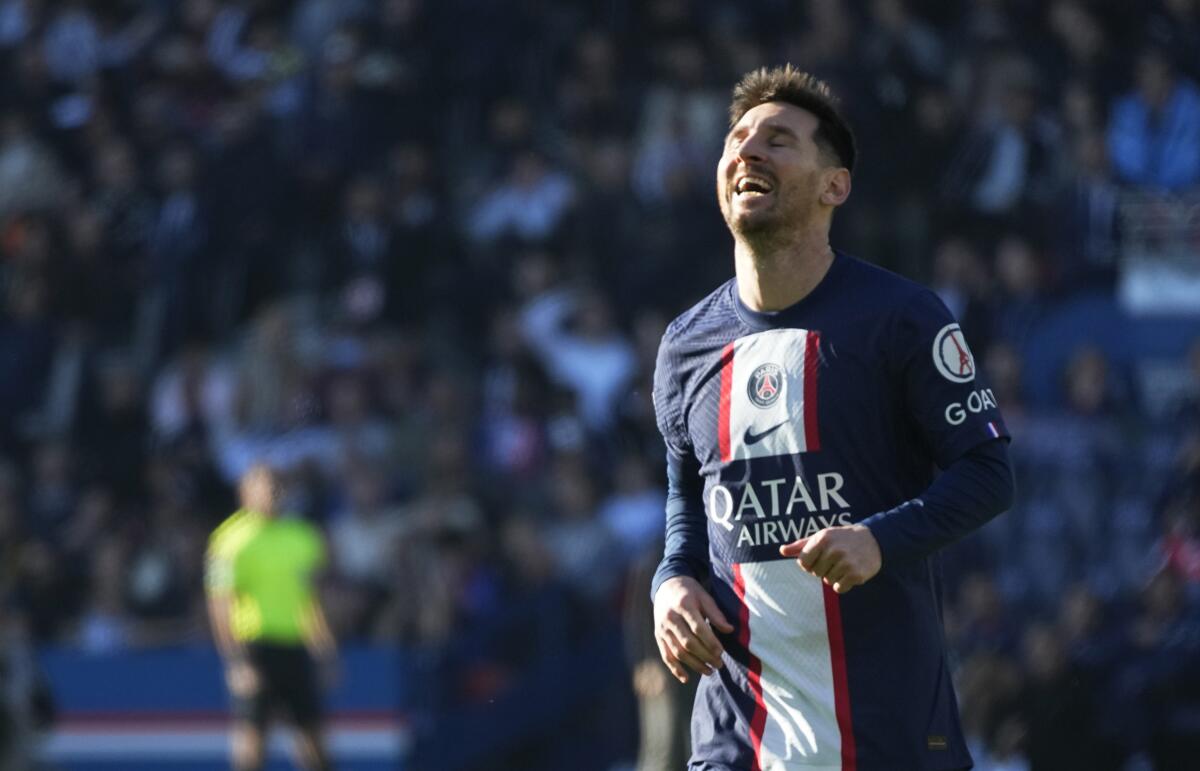 PSG's Lionel Messi reacts after missing a scoring chance during the French League One soccer match 